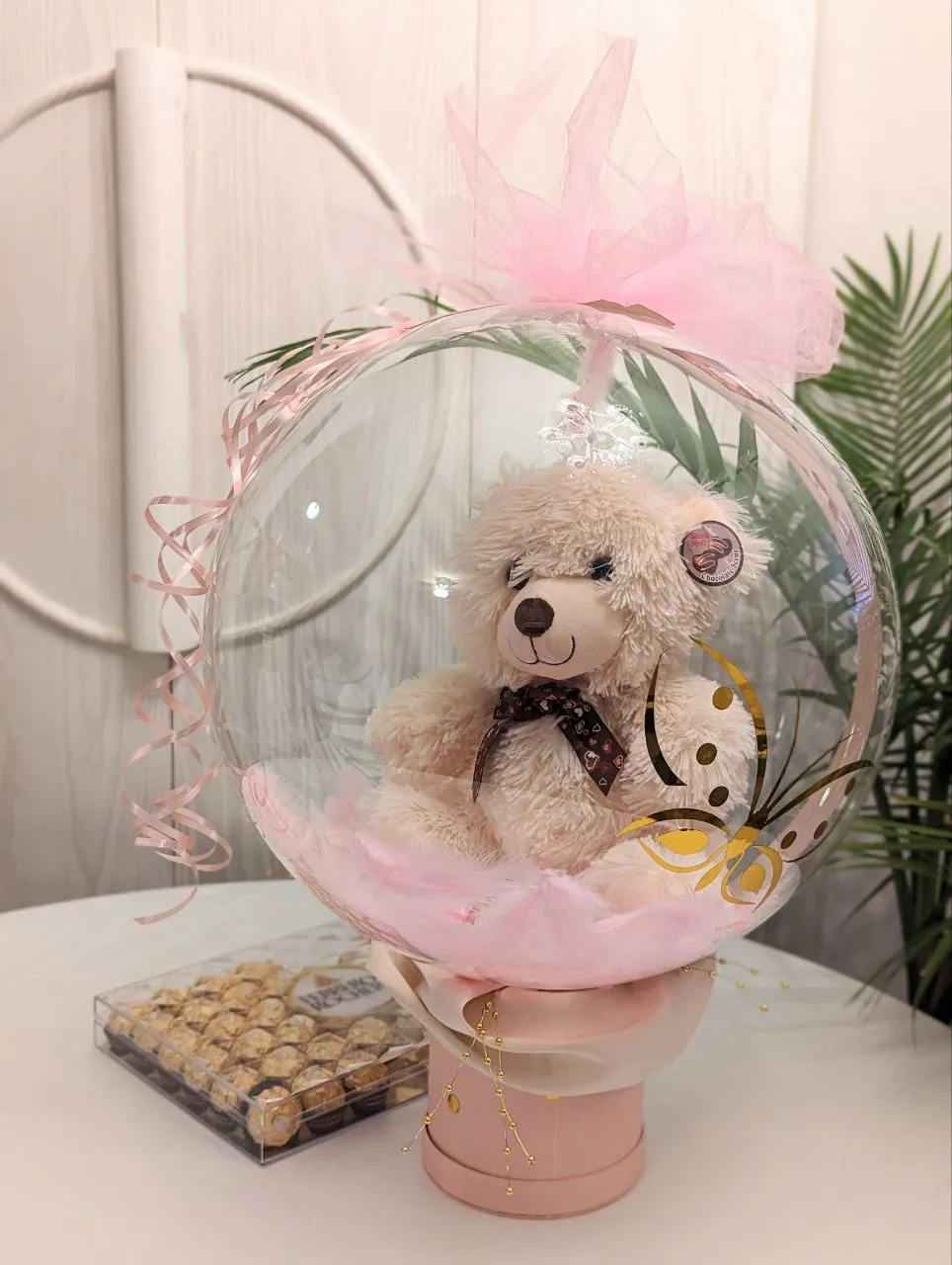 teddy bear in bubble balloon