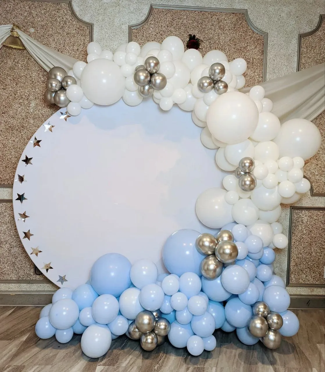 round backdrop with cloud arch